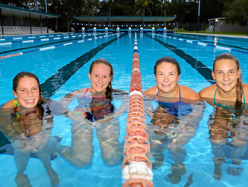 WATER BABES: Ocean swimmers (from left) Maddy Gough, Amanda Zerbe and Jess and Maddi Carah on a break from practise laps in still waters at the pool. contributed WATER BABES: Ocean swimmers (from left) Maddy Gough, Amanda Zerbe and Jess and Maddi Carah on a break from practise laps in still waters at the pool. contributed